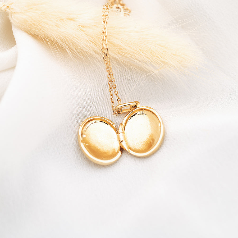Collier médaillon secret
